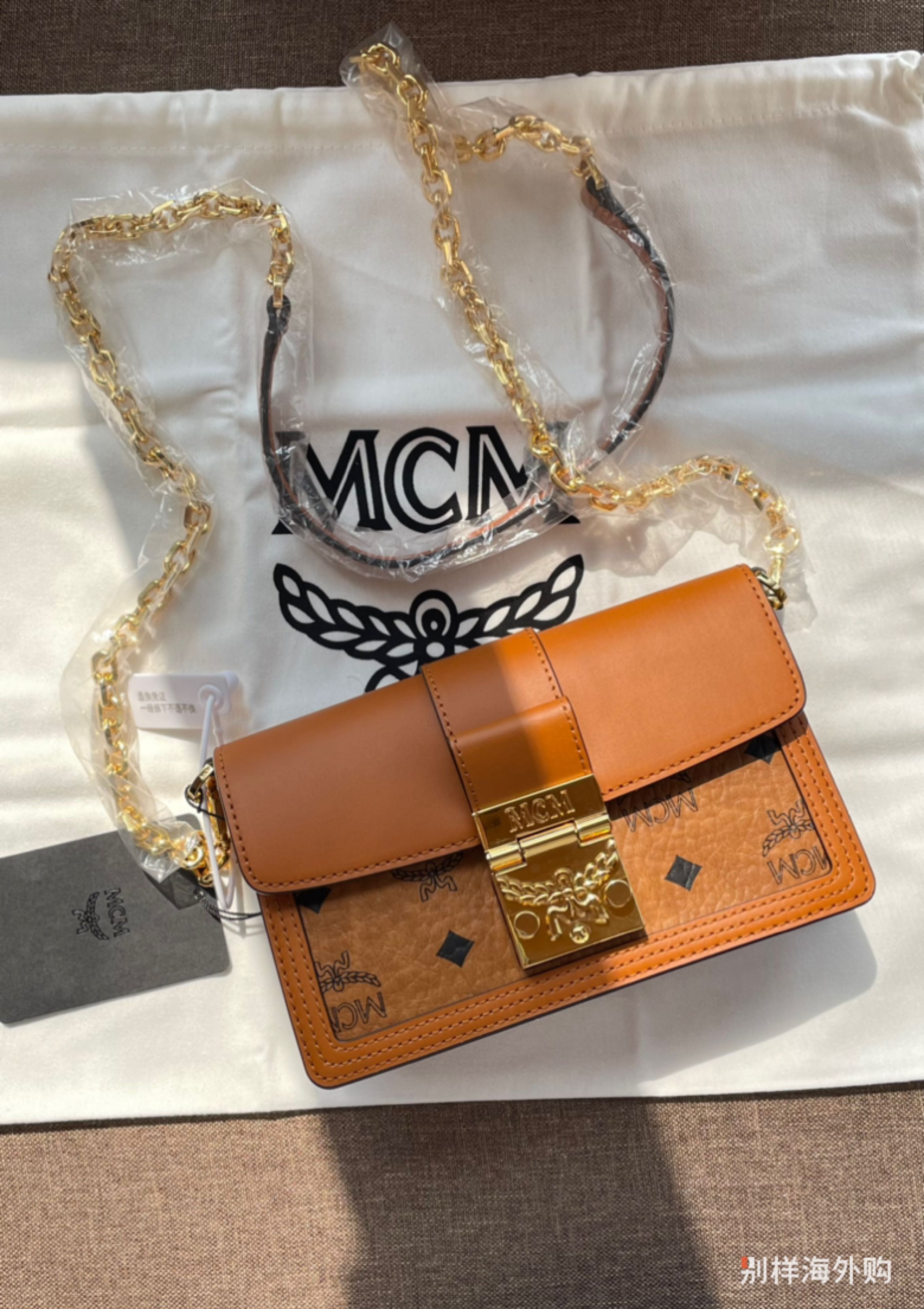 $595 MCM Mini Tivitat Black Monogram Leather Crossbody Sling Bag  MXZ9ABT27BK001