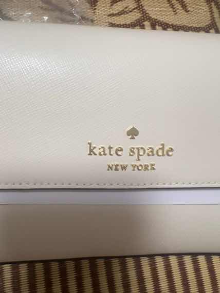 用户l***9对商品的晒单评价: 非常不错，一直想要个白色的小包#kate spade#别样海淘, 点赞数: 24